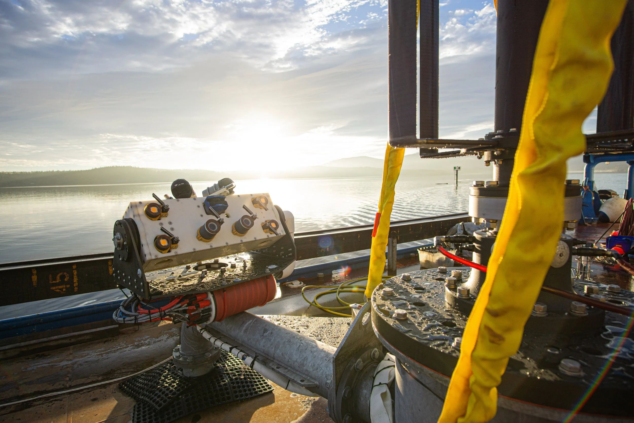 MarineSitu AMP platform on a deployment barge at sunset