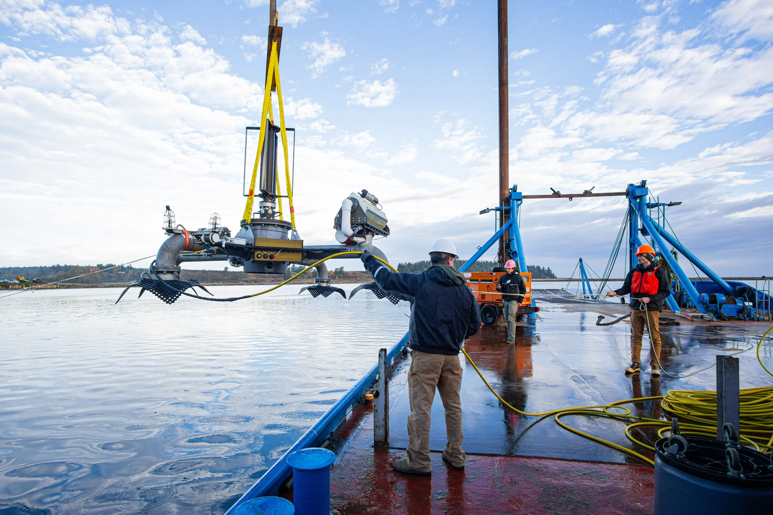 MarineSitu LAMP lander being deployed from a barge into the ocean
